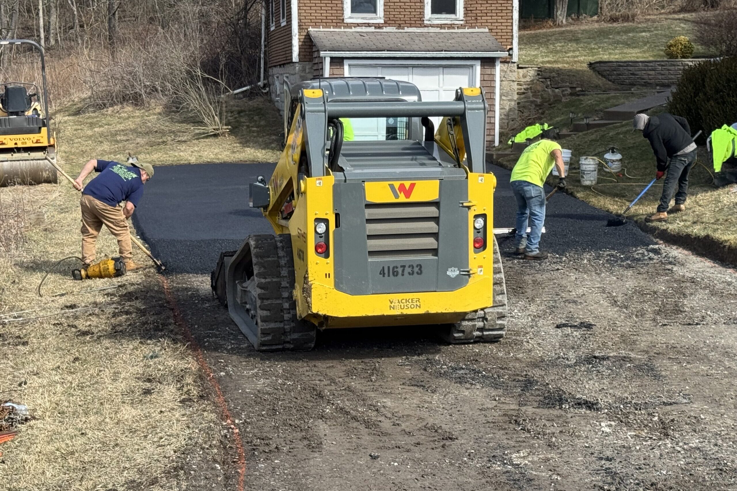 resurface or replace asphalt driveway
